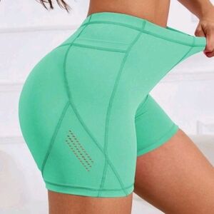 Green Athletic shorts sports bras and crop tank top set sz. Large